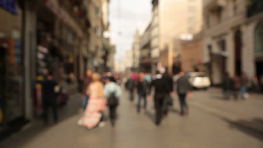 Out of focus background and unrecognizable people walking in Istiklal Street in Istanbul 