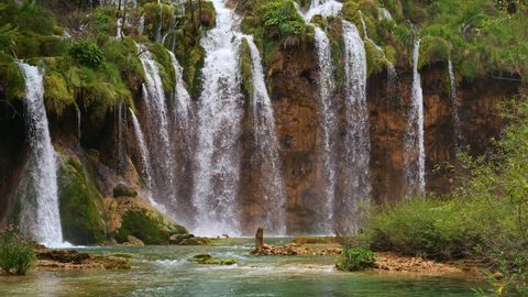 Lakes with waterfall in Croatia Europe. Location: Plitvice National Park Plitvicka jezera. 4k