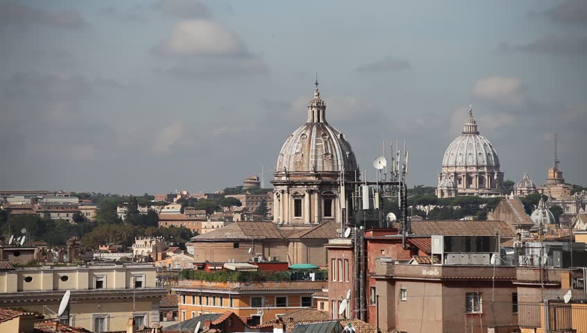 Rome panoramic view with flying bird, cityscape with rooftops, Italy