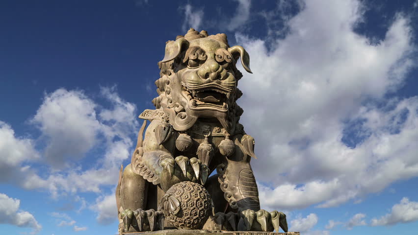 Bronze Guardian Lion Statue in Yonghe Temple (Lama Temple) in Beijing, China