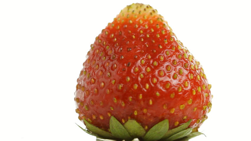 strawberries on white, rotating