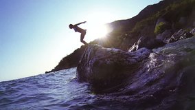 Slow motion video girl diving Black Sea