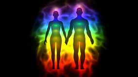 Aura and chakras - silhouette of woman and man