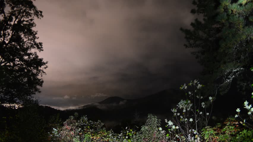 midnight on blue ridge parkway with fog and clouds timelapse