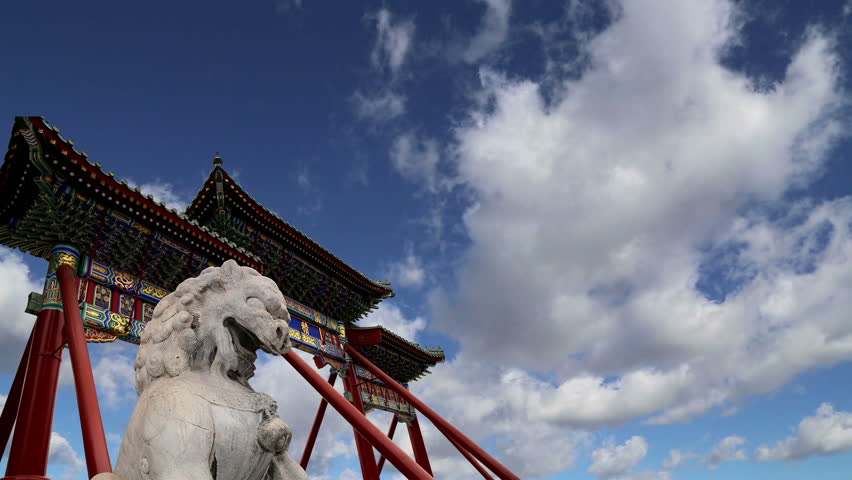 Stone Guardian Lion Statue in Beihai Park -- is an imperial garden to the northwest of the Forbidden City in Beijing, China    