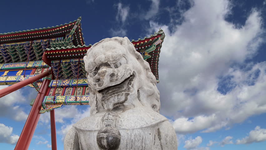 Stone Guardian Lion Statue in Beihai Park -- is an imperial garden to the northwest of the Forbidden City in Beijing, China    
