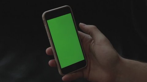 Iphone 6 swiping hand green screened 