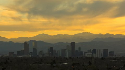 Denver Colorado USA sunset skyline skyscraper building city dusk Rockies sky downtown travel business office time lapse