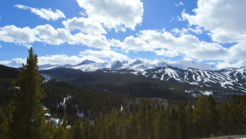 Breckenridge Colorado Rockies snow winter mountain National Park trees sky clouds cloudscape travel tourist hiking resort time lapse