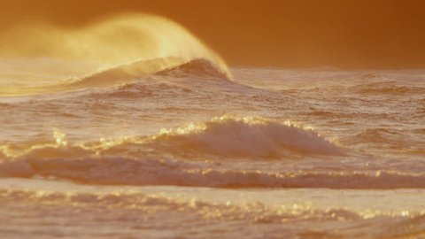 Hawaii sunset Pacific ocean surfing wave haze breaking power tidal nature tropical seascape travel tourist vacation RED EPIC