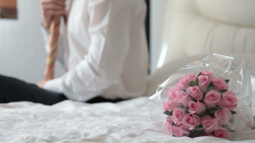 groom tying his tie preparing wedding Stock Footage Video (100% Royalty ... - Tying A Tie For A Groom Party