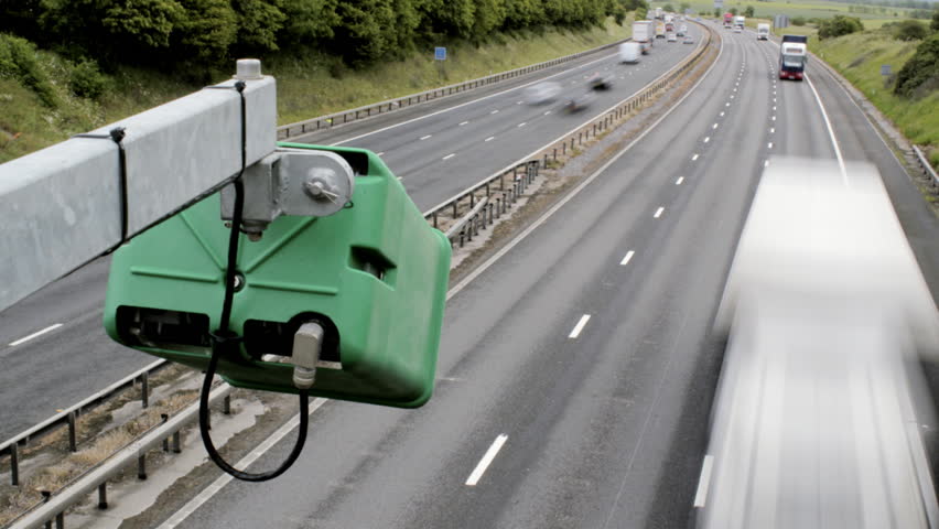 Timelapse of traffic on British motorway with road monitoring camera. Easily