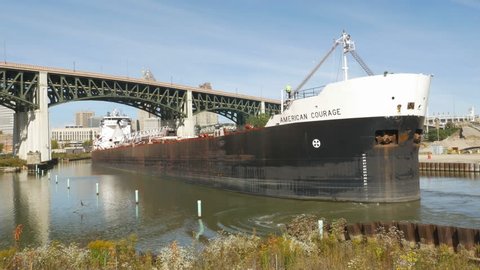 CLEVELAND, USA on OCT 10th: Laker 'MV American Courage' passes in Cleveland, Ohio on Oct 10th, 2015. Built in 1979 the large diesel-powered Lake freighter is owned by the American Steamship Company. 
