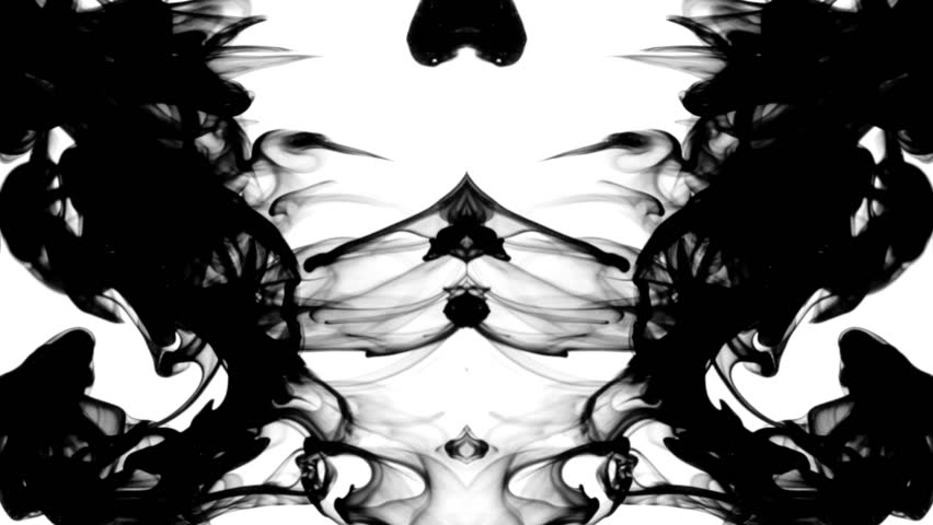 Black ink in water leaving screen like a disappearing Rorschach inkblot test,