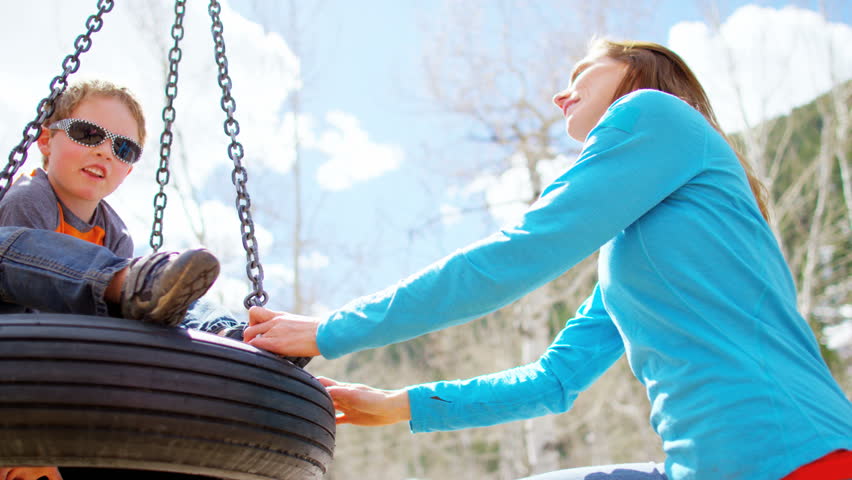 Caucasian family female parent young son childhood play outdoor lifestyle tree activity tourism promotion leisure travel RED DRAGON