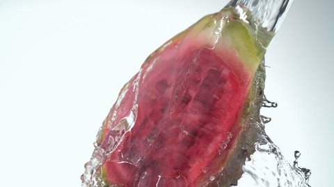 Water splash and prickly pears. Shot with high speed camera, phantom flex 4K. Slow Motion.