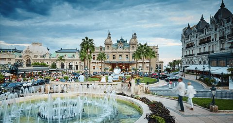 Monaco, Monte-Carlo, 2015.09.04: The square of ??the casino, Casino Monte-Carlo , hotel de Paris, fountain, mirror, cafe de Paris, time-lapse, 4k video