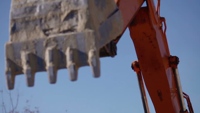 Excavator is digging the ground, sand HD