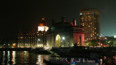 Mumbai, India: September 8,2015: 4K footage of Gateway of India and Hotel Taj Mahal Palace at night, shot from a Ferry boat on September 8, 2015.
