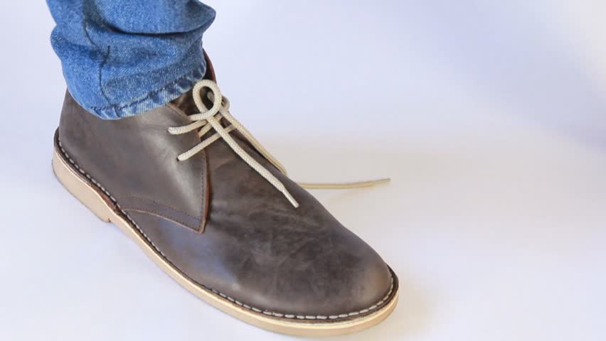 Men's shoes on a white background, to tie shoelaces