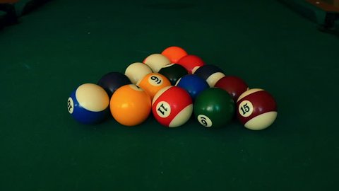 The billiard ball ricocheted in a billiard pocket, slow motion