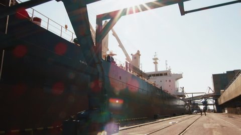 Big Cargo Ship in Harbor. Shot on RED Cinema Camera in 4K (UHD).