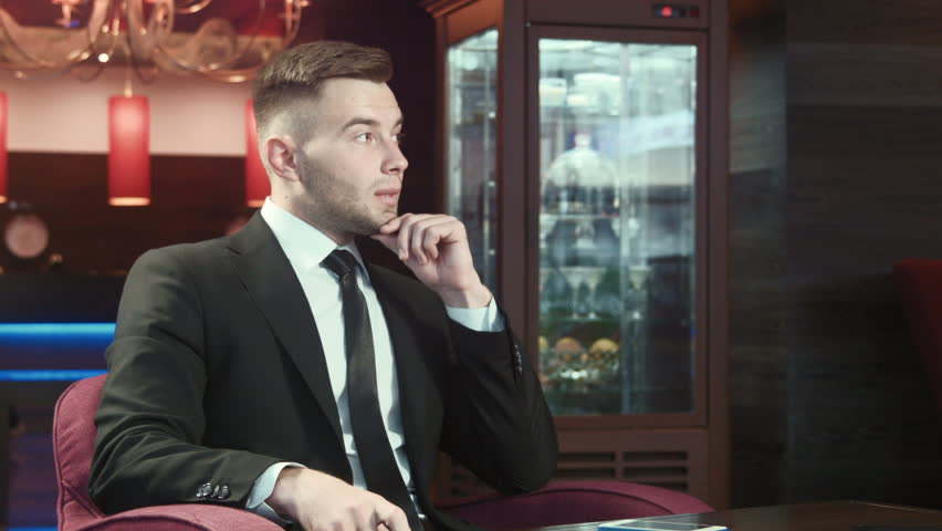 Businessman waiting for meeting and nervous