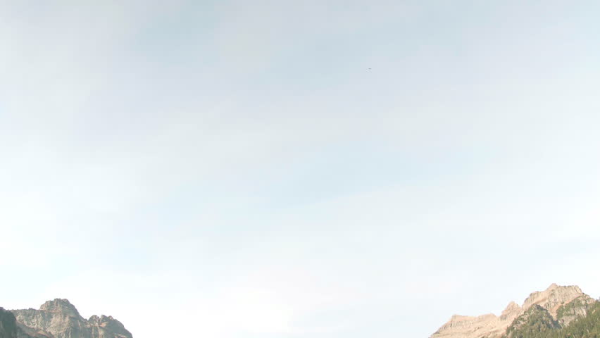 Pan Down then Up to Scenic View of Cascade Mountain Lake.  Beautiful Turquoise Blanca Lake Hiking Trail 