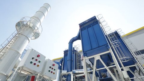Waste-to-energy facility from the outside. The energy-from-waste is the process of generating energy in the form of electricity or heat from the primary treatment of waste. Tilt.
