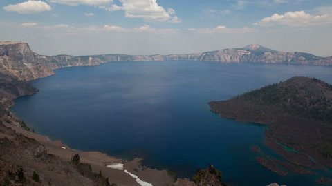 4K Timelapse zoom out Crater Lake National Park, Oregon, USA, with a ship passing by