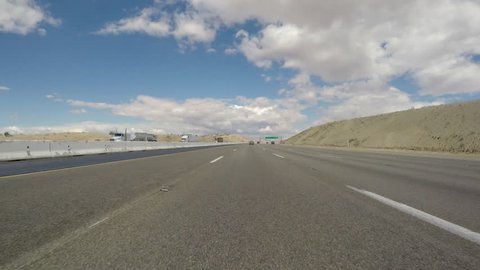 BARSTOW, CALIFORNIA, USA - October 7, 2015:  Las Vegas Interstate 15 overhead highway sign driving shot.