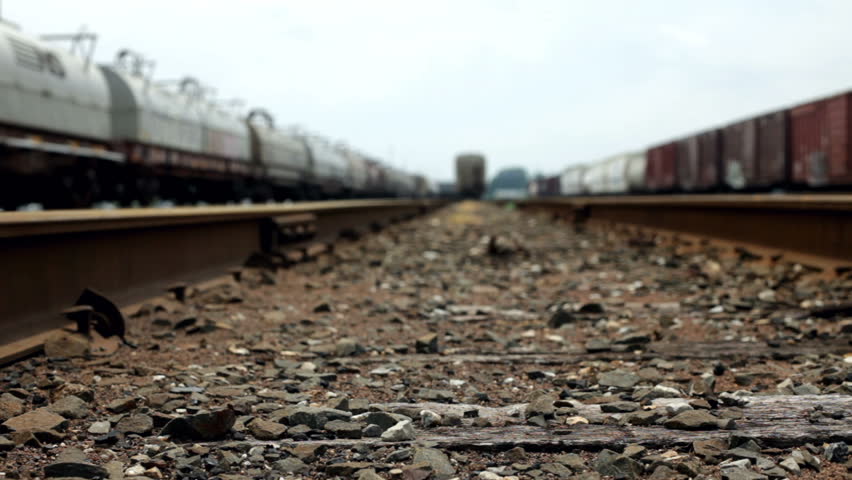 Camera moving between railroad tracks