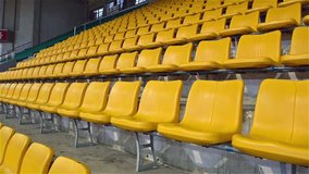 yellow stadium seats zooming in