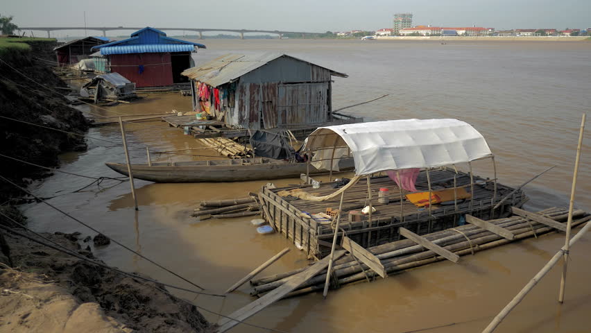  Small houseboats moored at the river