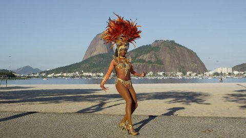 Samba dancing in full costume in Rio de Janiero beach