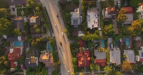 Top down aerial view of street traffic and residential neighborhood around Hollywood Boulevard, Los Angeles, California. 4K UHD.