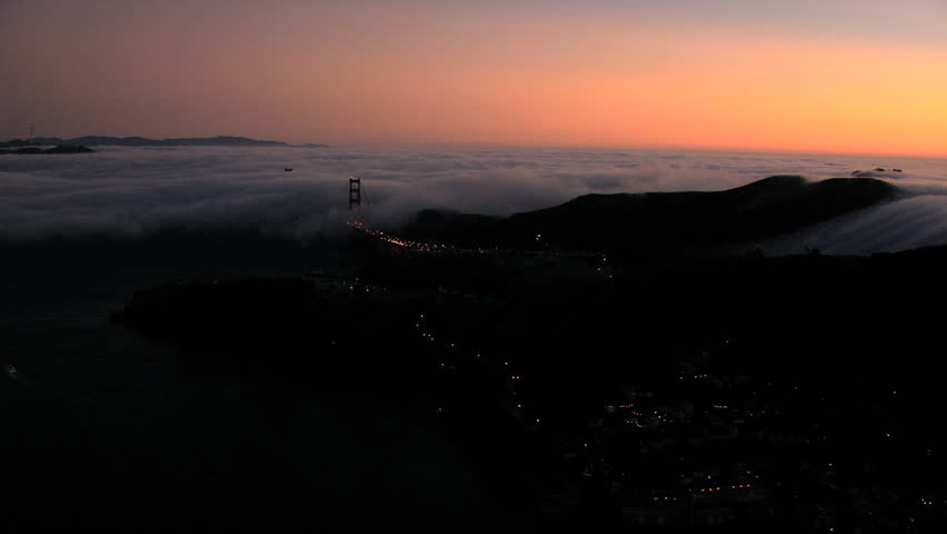 Aerial sea fog sunset San Francisco Bay Golden Gate USA
