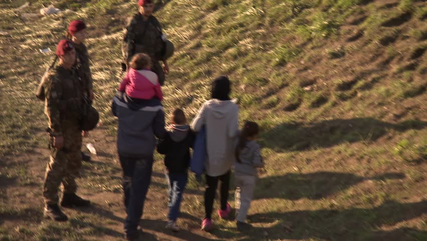 Dramatic pictures from the Slovene refugee camp.
Many children suffer from end exhaustion because,the long walking.
Into Slovenia daily cca 10000 refugees arrive.
25.10.2015 Slovenia Brezice; | Shutterstock HD Video #12438695