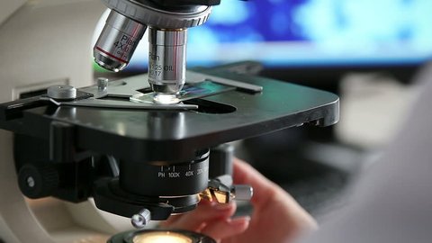 Microbiology laboratory work with microscope HD