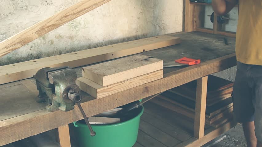 Carpenter working in his "office".