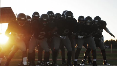 A football team gets pumped before a game