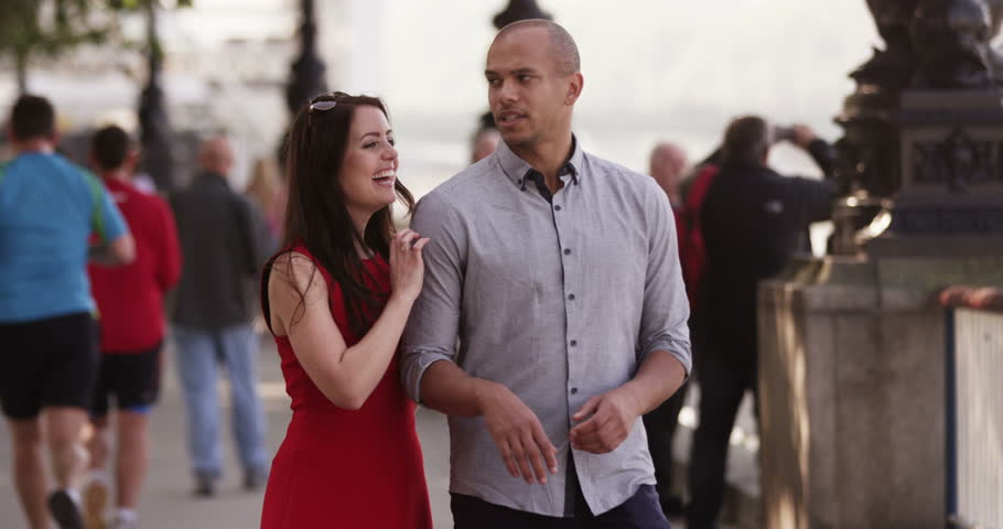 Happy young couple spending time together in London. Shot in slow motion on RED Epic.