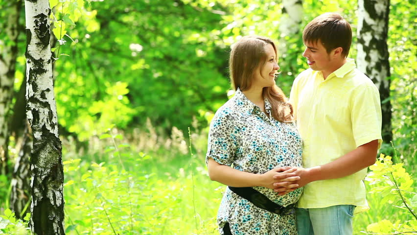 Happy pregnant couple loves the unborn baby 