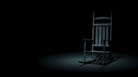 Spooky Rocking Chair On Dark Background