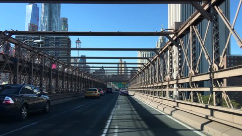 Crossing the Brooklyn Bridge by car. Hi res 4K