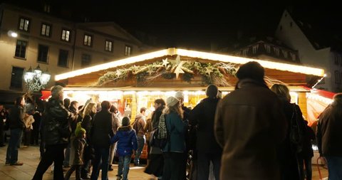 STRASBOURG, FRANCE - CIRCA 2015: Christmas stall selling food and traditional gluhwein (Hot-spiced Wine) at Christkindlesmarkt Christmas Market in Strasbourg, Place de la Cathedrale 