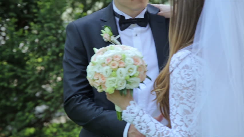 Passionate kiss of a young married couple only