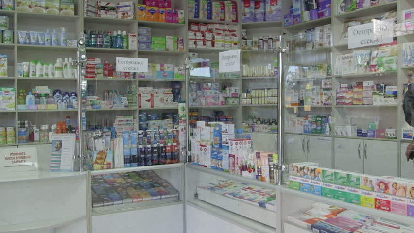 SIMFEROPOL, RUSSIA - CIRCA OCTOBER 2015: Shelves full of medications in pharmacy drugstore pan shot | Shutterstock HD Video #12502208