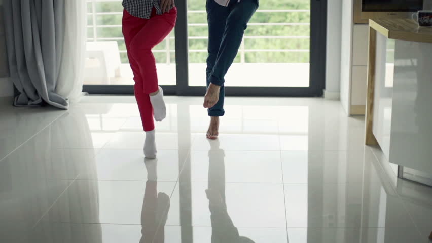 Young couple dancing at home, slow motion 240fps
 | Shutterstock HD Video #12504350