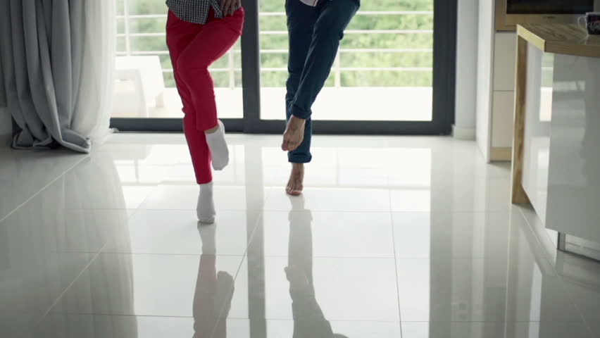 Young couple dancing at home
 | Shutterstock HD Video #12504362